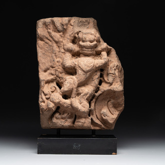 An architectural red sandstone fragment with a divinity, India, 13th C.
