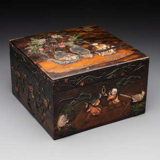 A square Chinese embellished and lacquered wooden box depicting a musician and two boys, Qing