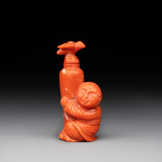 A Chinese carved red coral 'boy and vase' snuff bottle and stopper, 19th C.