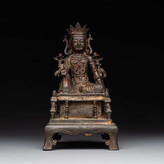 A Chinese bronze Bodhisattva on stand, Yongle mark, dated 1422