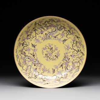 A Chinese yellow-ground famille rose 'magpie and plum tree' plate, Tongzhi mark and of the period