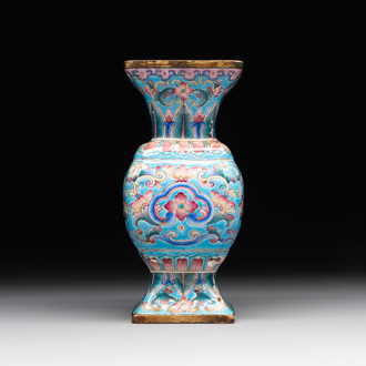 A Chinese Canton enamel 'gu' vase with floral design, Qianlong mark and of the period