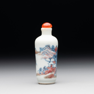A Chinese blue, white and copper-red 'landscape' snuff bottle, 19th C.