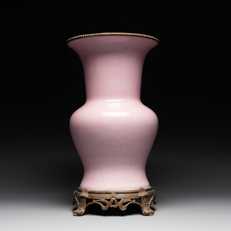 A large Chinese monochrome pink-glazed 'gu' vase with bronze mounts, 19/20th C.
