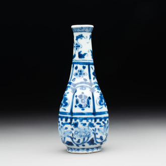 A Chinese blue and white facetted bottle vase with floral design, Kangxi