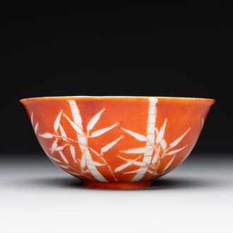 A Chinese coral-red-glazed bowl with reverse-decorated bamboo design, Xuantong mark and of the period