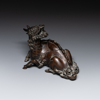 A fine Chinese bronze 'qilin' censer and cover, Ming