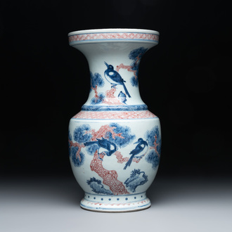 A fine Chinese blue, white and copper-red 'magpie and pine tree' vase, Yongzheng/Qianlong