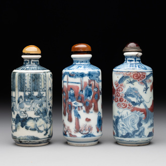 Three Chinese blue, white and copper-red snuff bottles, 19th C.