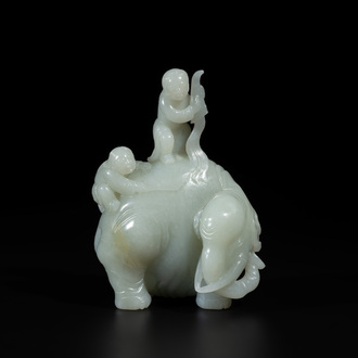 A Chinese celadon jade group of two boys cleansing an elephant, 18th C.
