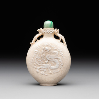A rare Chinese monochrome ge-type 'chilong' snuff bottle with jadeite stopper, Qianlong mark and of the period