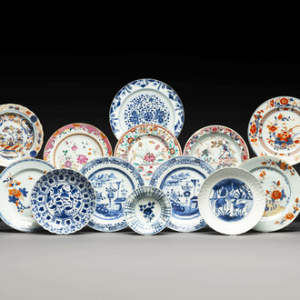 A group of thirteen Chinese blue, white and famille rose plates and a bowl, late Ming/early Qing