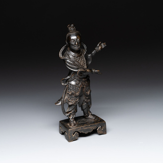 A fine Chinese bronze figure of a divinity, Ming