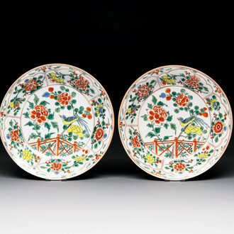 A pair of Chinese famille verte 'bird and peonies' plates, Kangxi