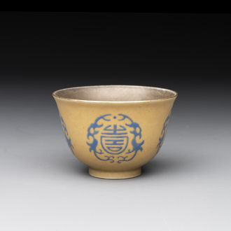 A Chinese blue enamel on gilt ‘Shou’ cup, 19th C.