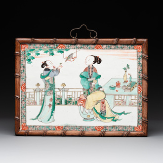 A Chinese famille verte plaque with ladies in a garden, Kangxi