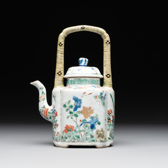 A Chinese famille verte 'flower and butterfly' teapot with an upright handle, Kangxi