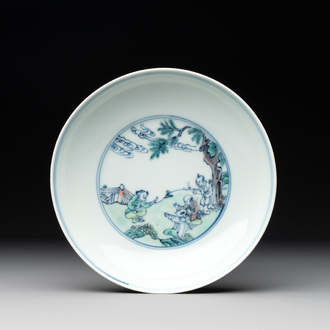 A Chinese doucai 'playing boys' plate, Chenghua mark, 18th C.