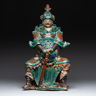 An impressive and fine Chinese sancai-glazed biscuit Guandi, Ming, 17th C.