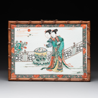 A Chinese famille verte plaque with ladies in a garden, Kangxi