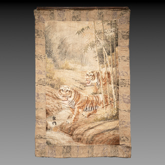 A Japanese embroidered silk wall tapestry with two tigers, Meiji, 19th C.