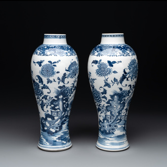 A pair of Chinese blue and white vases with floral design, Qianlong