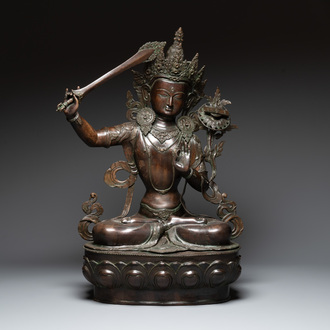 A very large Nepalese bronze sculpture of Manjusri, 19/20th C.