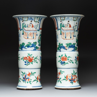 A pair of Chinese wucai 'gu' vases with narrative design, Transitional period