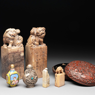 Two Chinese snuff bottles, four soapstone seals and a lacquer covered box, 20th C.