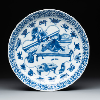 A Chinese blue and white 'erotic scene' plate, Kangxi