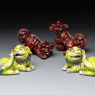 A pair of Chinese polychrome-glazed Buddhist lions and a pair of red-glazed Shiwan Buddhist lions, 19/20th C.