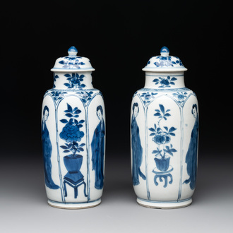 A pair of Chinese blue and white 'Long Eliza' vases and covers, jade mark, Kangxi