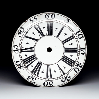 An English Delftware clock face dial with Roman numerals, 18th C.