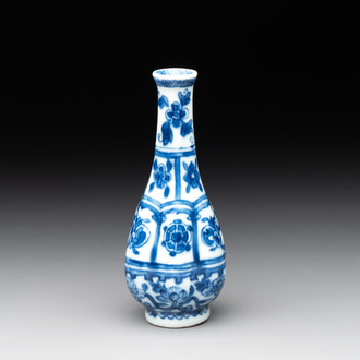 A Chinese blue and white facetted bottle vase with floral design, Kangxi