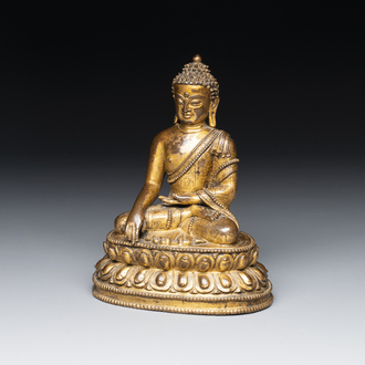 A fine Sino-Tibetan gilt-bronze Buddha, 15/16th C.