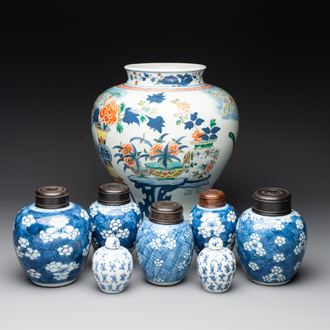 A Chinese wucai vase and seven blue and white jarlets, 19th C.