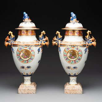 A pair of Chinese export famille rose urns and covers, Qianlong