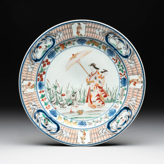 A Japanese Imari 'Parasol Ladies' plate after Cornelis Pronk, Edo, 18th C.