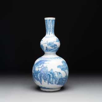 A blue and white Dutch Delft double gourd chinoiserie vase, 17th C.