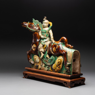 A massive Chinese sancai-glazed roof tile in shape of a horse rider, Ming