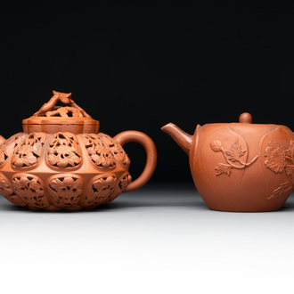 A Chinese Yixing stoneware reticulated double-walled teapot and a teapot with floral relief design, Kangxi