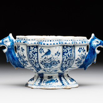 A rare blue and white Dutch Delft tulip vase base with dragon-from handles, 17/18th C.