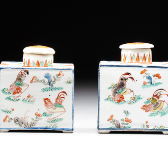 A pair of Chinese famille verte rectangular tea caddies and covers with fighting roosters, Kangxi