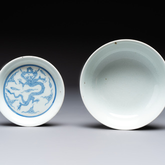 A Chinese monochrome 'anhua' 'dragon' bowl and a blue and white 'dragon' saucer, 18/19th C.