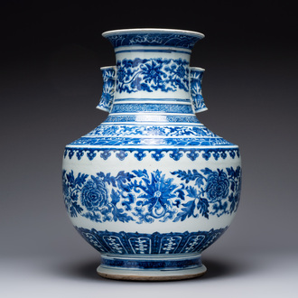 A large Chinese blue and white 'lotus and peony scroll' 'hu' vase, 19th C.