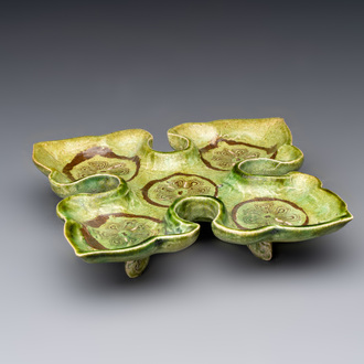 A Chinese green-glazed marbled dish, probably Tang