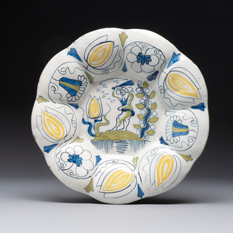 A rare polychrome Dutch Delft 'wildman' dish, 17th C.