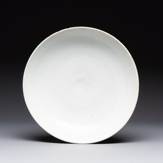 A Chinese white-glazed incised 'double phoenix' dish, Jiajing mark and of the period