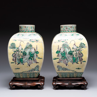 A pair of Chinese verte biscuit covered square jars on wooden stand, 19th C.