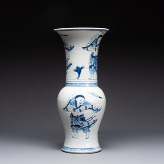 A Chinese blue, white and copper-red 'Liuhai' 'yenyen' vase, Kangxi